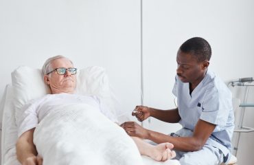 male-nurse-caring-for-patient.jpg